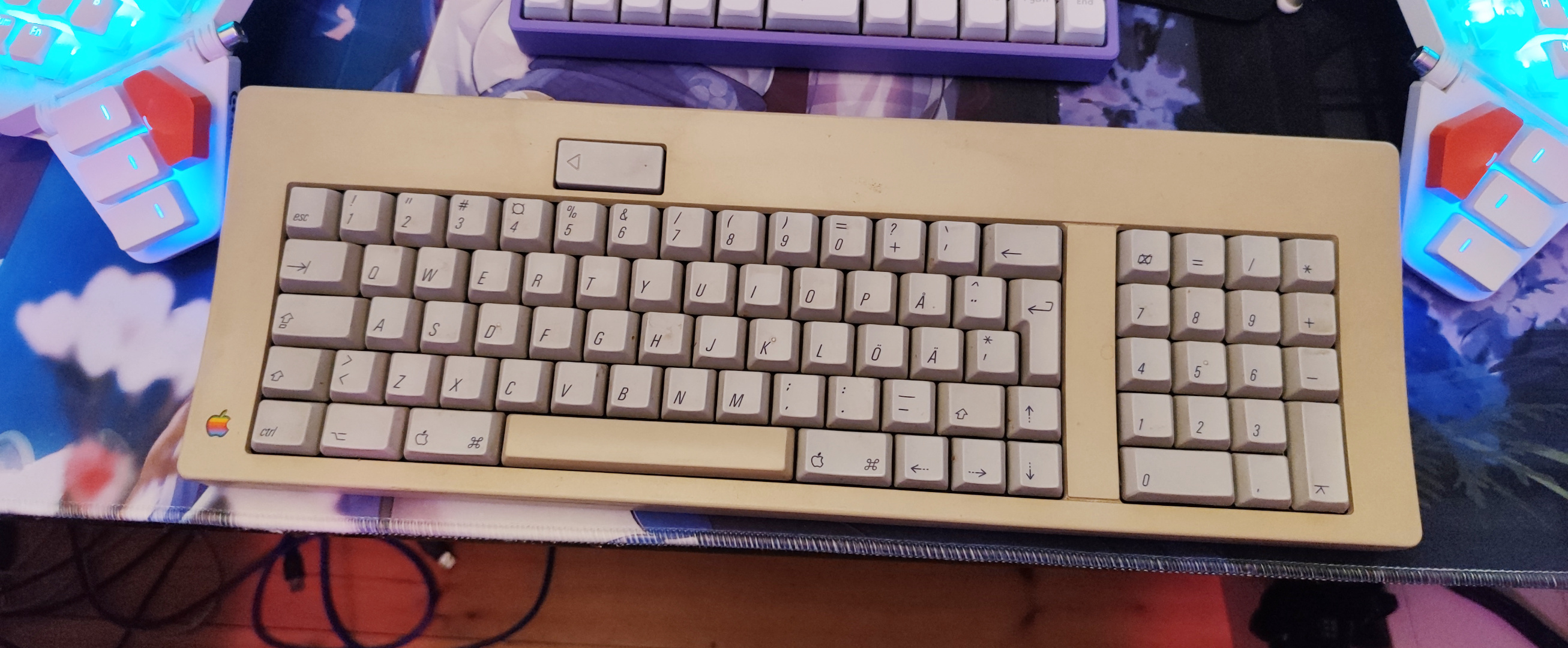 ADB keyboard with arrow keys in an L shape